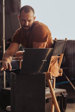 man working on a laptop.