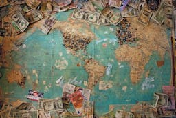 money on the world map.