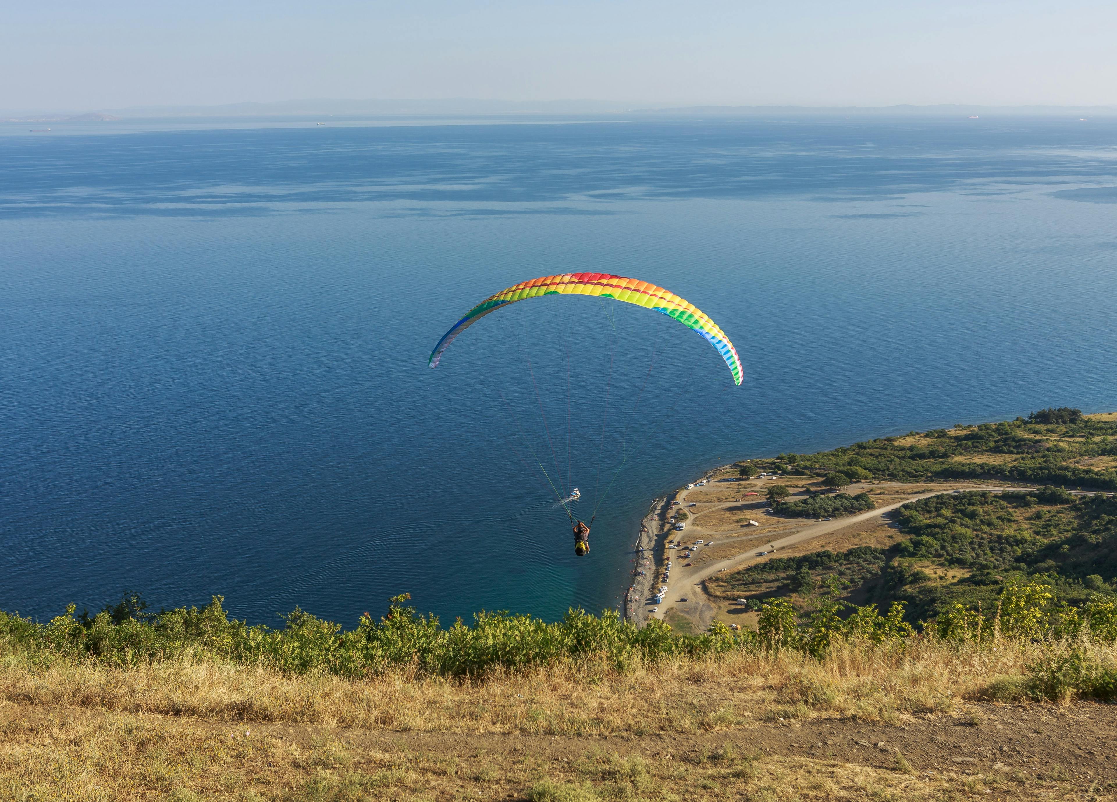 paragliding over the islands in the summer.