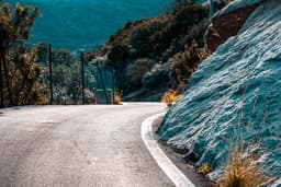 road in the mountains with blue sky.